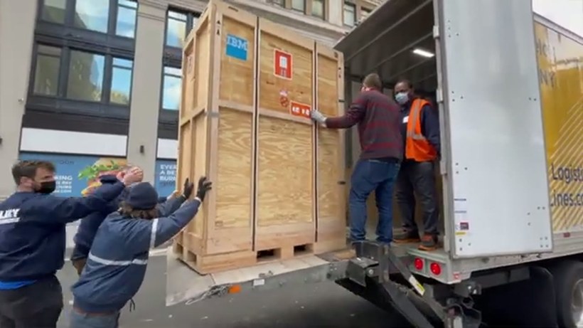 G & G Moving crew handling a piece on a Delaware job