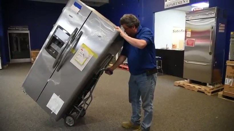 G & G Moving crew handling a piece on a Delaware job